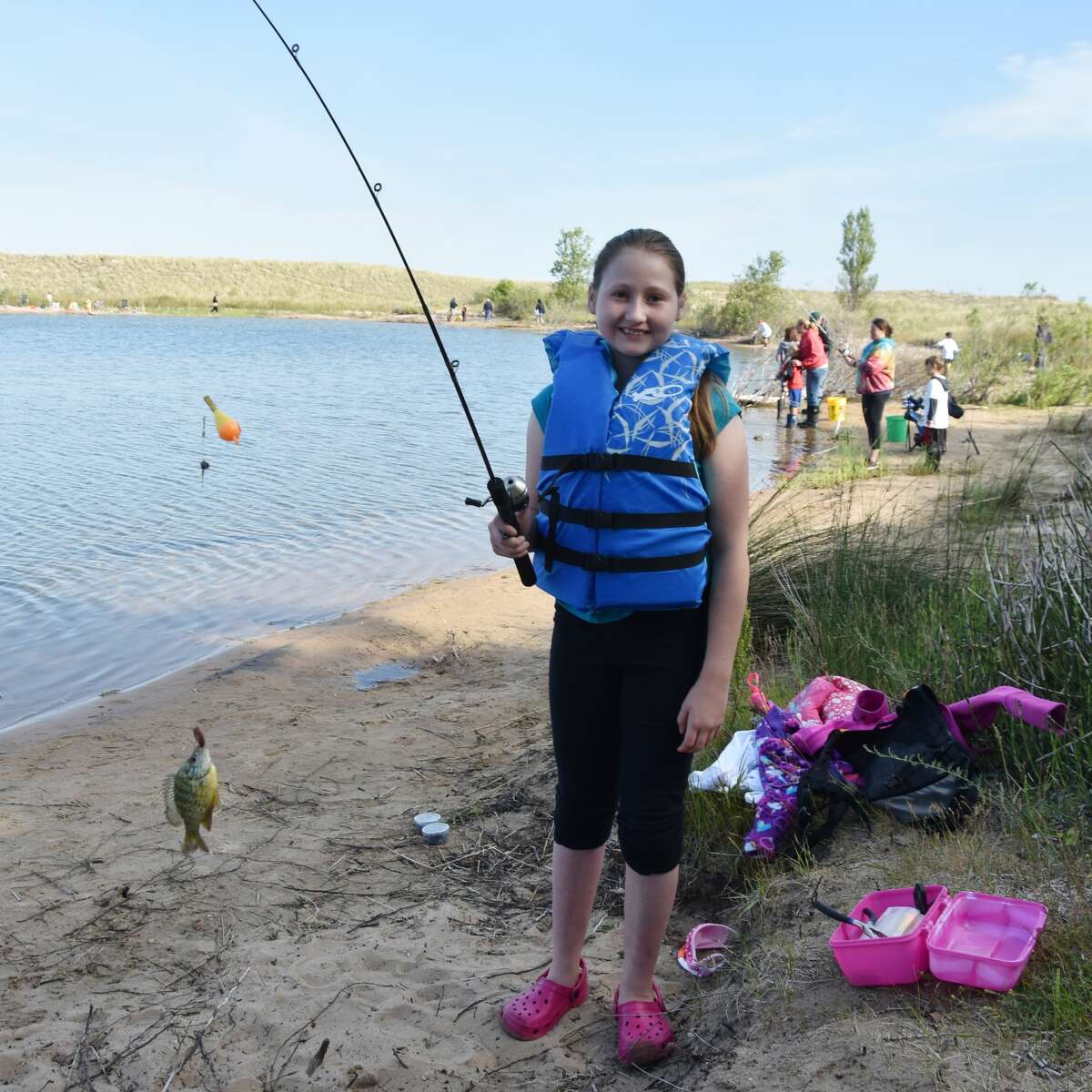Emma Campbell caught a bluegill on her first cast at Man Made Lake during the Kids Fish Day event.