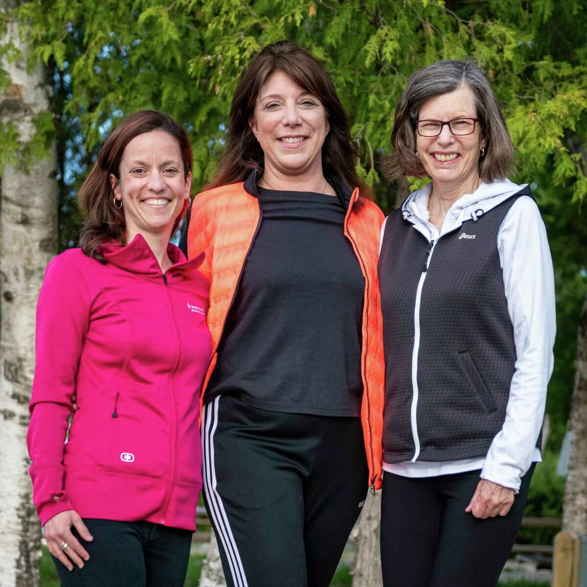 Adrienne Stephen Jones (left), Nancy Smith (middle)and Michelle Russell (right) will be participating in the Ironman event in September to raise money for Paul Oliver. (Courtesy Photo)