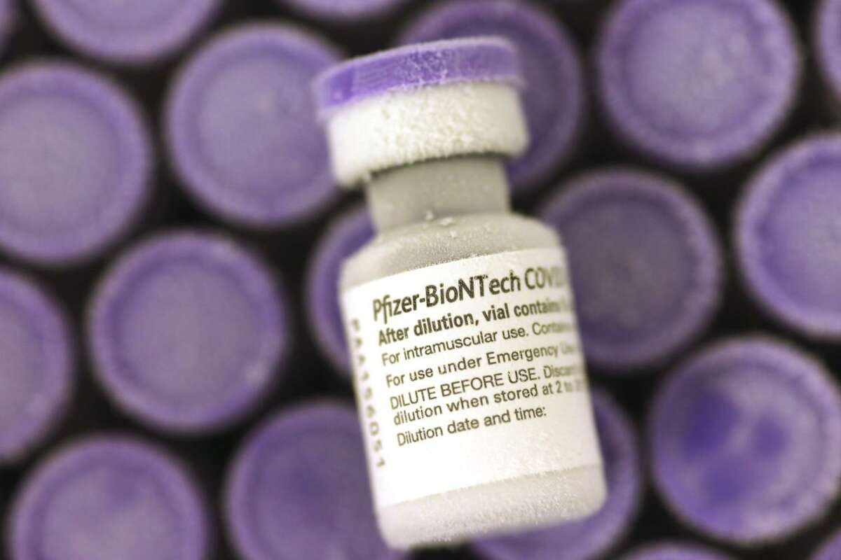 Doses of the Pfizer-BioNTech COVID-19 vaccine are showns at Rady Children's Hospital in San Diego. Children as young as 12 should receive the Pfizer-BioNTech coronavirus vaccine, a panel of advisers to the U.S. Centers for Disease Control and Prevention recommends.