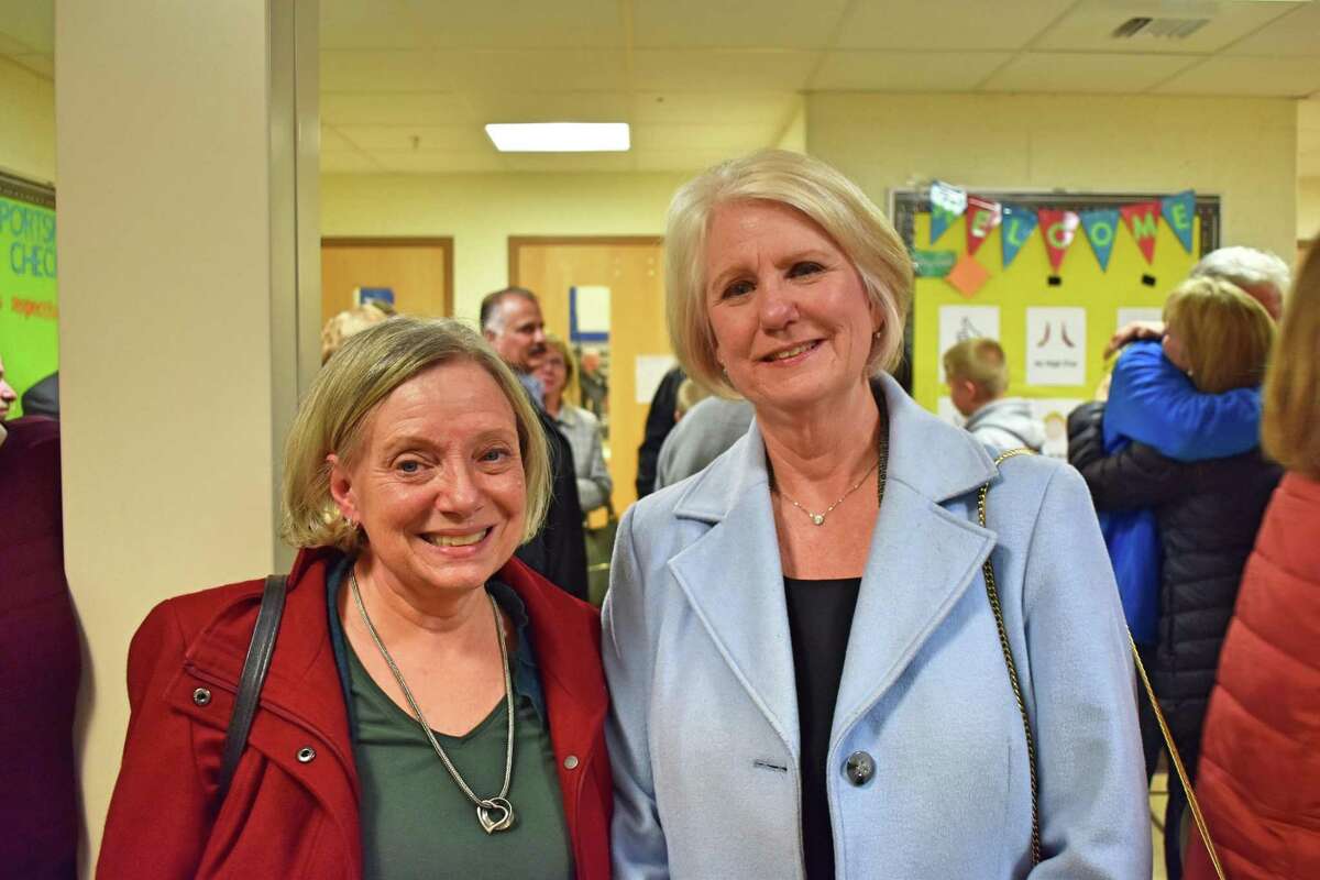 New Fairfield First Selectman Pat Del Monaco, right, and Selectman Khris Hall, left, at Meeting House Hill School following the announcement of the 2019 election results.