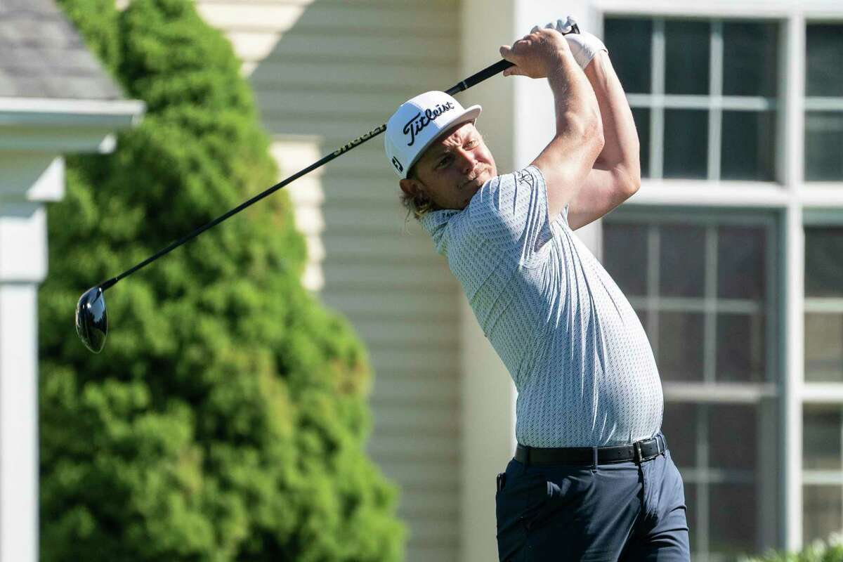 Cameron Smith hits off the sixth tee during professional-amateur team play ahead of the Travelers Championship golf tournament at TPC River Highlands, Wednesday, June 23, 2021, in Cromwell, Conn.