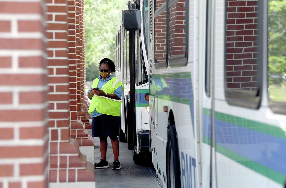 Buses load and unload at the transit station downtown Monday. Beaumont transit workers, represented by Amalgamated Transit Union Local 1031, failed to reach a contract negotiation with Transit Management of Beaumont, prompting the union to authorize a strike if necessary. Photo made Monday, June 14, 2021 Kim Brent/The Enterprise