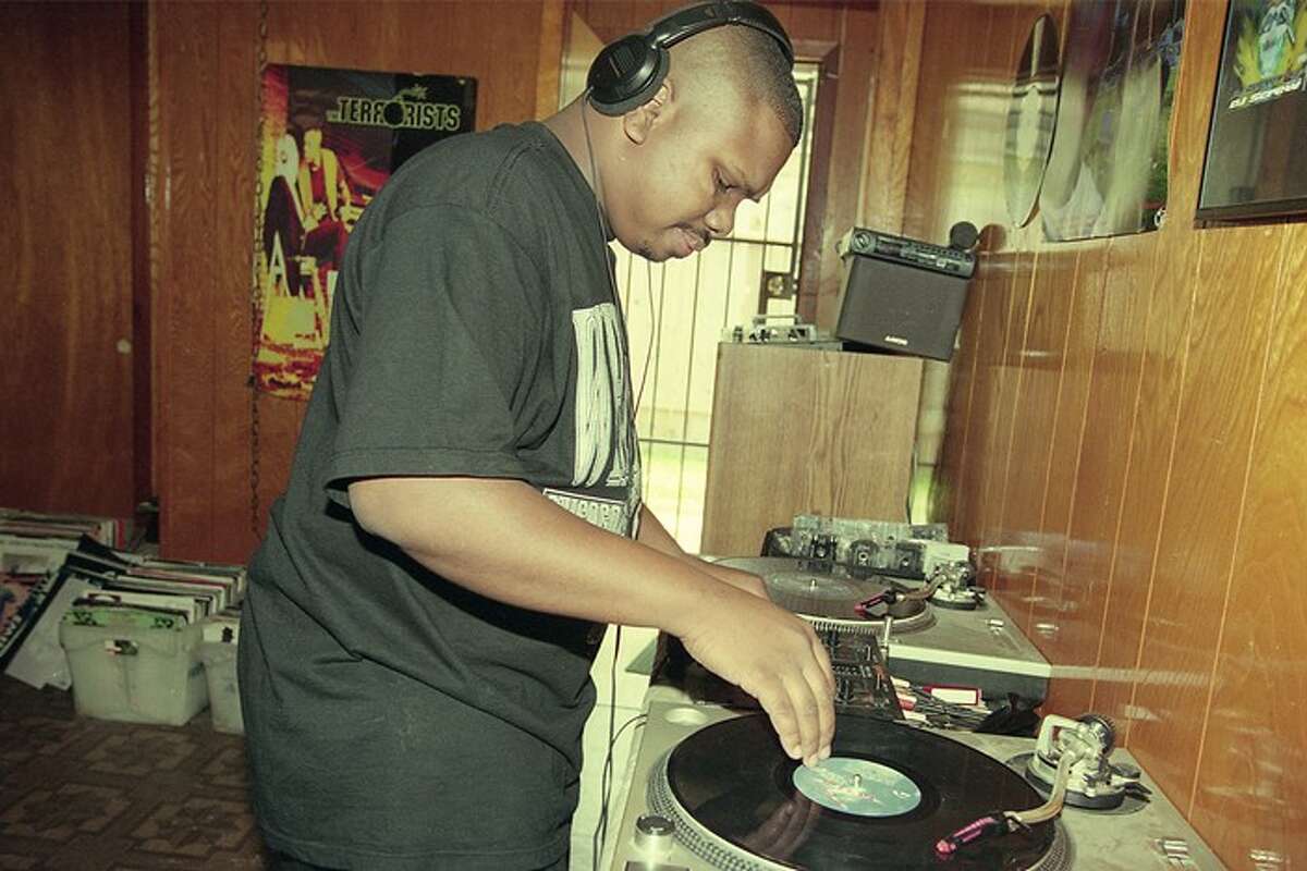 DJ Screw in his home studio. (Photo by Ben DeSoto, 1995. Photo courtesy of SoSouth Music Distribution.)