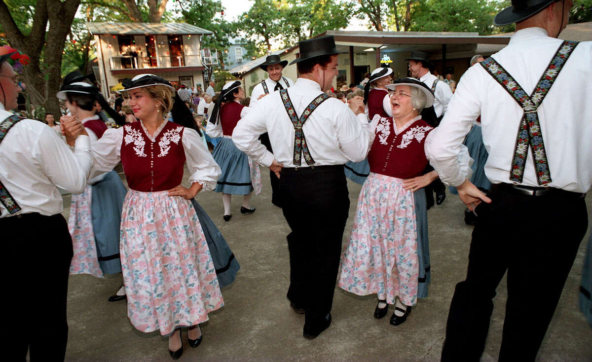 The Volkstanzverein which translates to folk dance club entertain the crowd at Fiesta Gartenfest held at Beethoven Garten. Photo by Doug Sehres/Staff. Shot on Film. 4/22/98. File 981785.