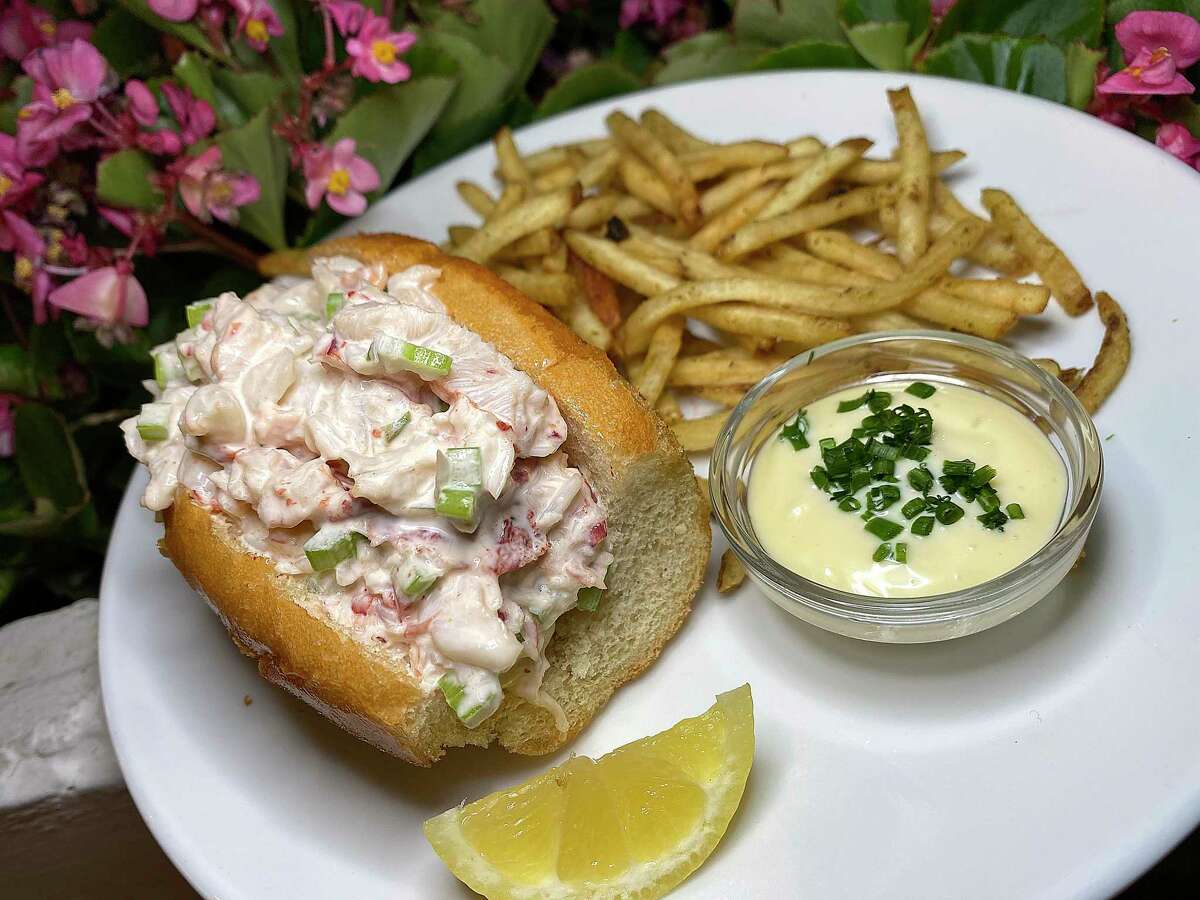 A lobster roll comes with tarragon aioli and shoestring fries at Little Em's Oyster Bar.