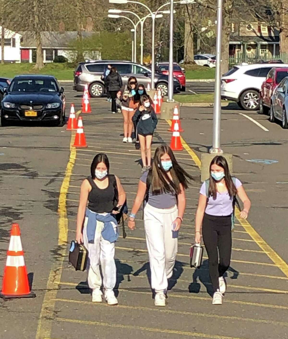 Ridgefield students will have to continue wearing masks while inside school buildings or buses next year, district officials announced Thursday.