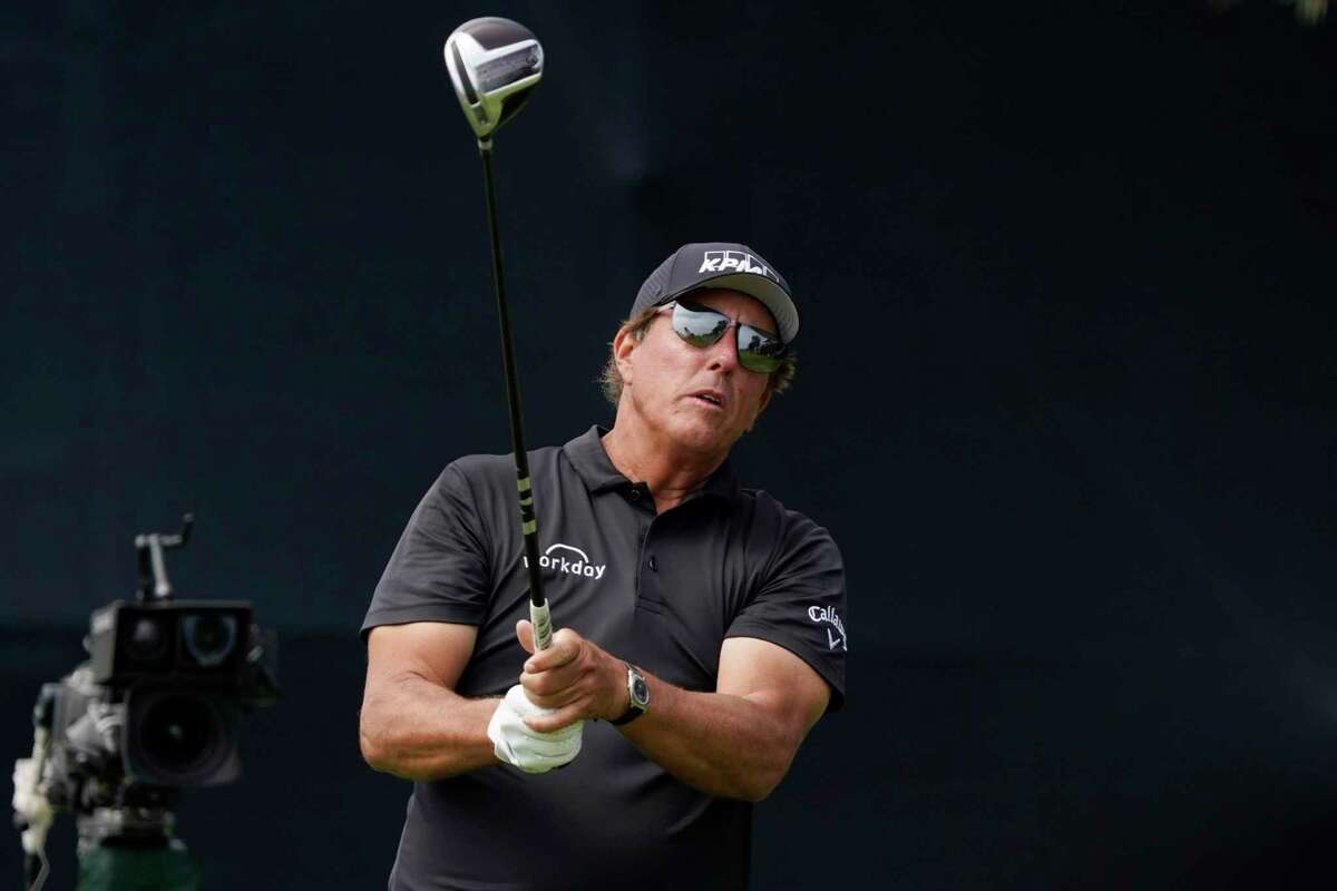 Phil Mickelson plays his shot from the seventh tee during the second round of the U.S. Open Golf Championship, Friday, June 18, 2021, at Torrey Pines Golf Course in San Diego. (AP Photo/Marcio Jose Sanchez)