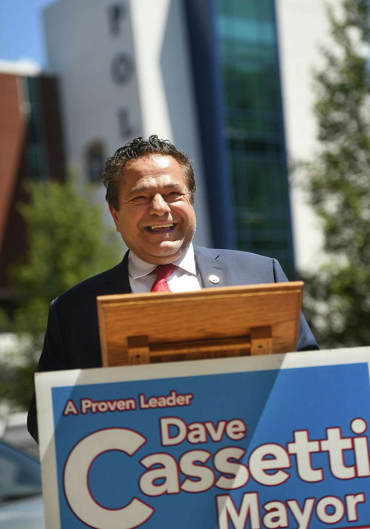 Ansonia Mayor David Cassetti smiles after mentioning his 95-year-old mother, Lillian, while announcing his plans to run for re-election on Main Street in Ansonia, Conn. on Thursday, June 24, 2021.