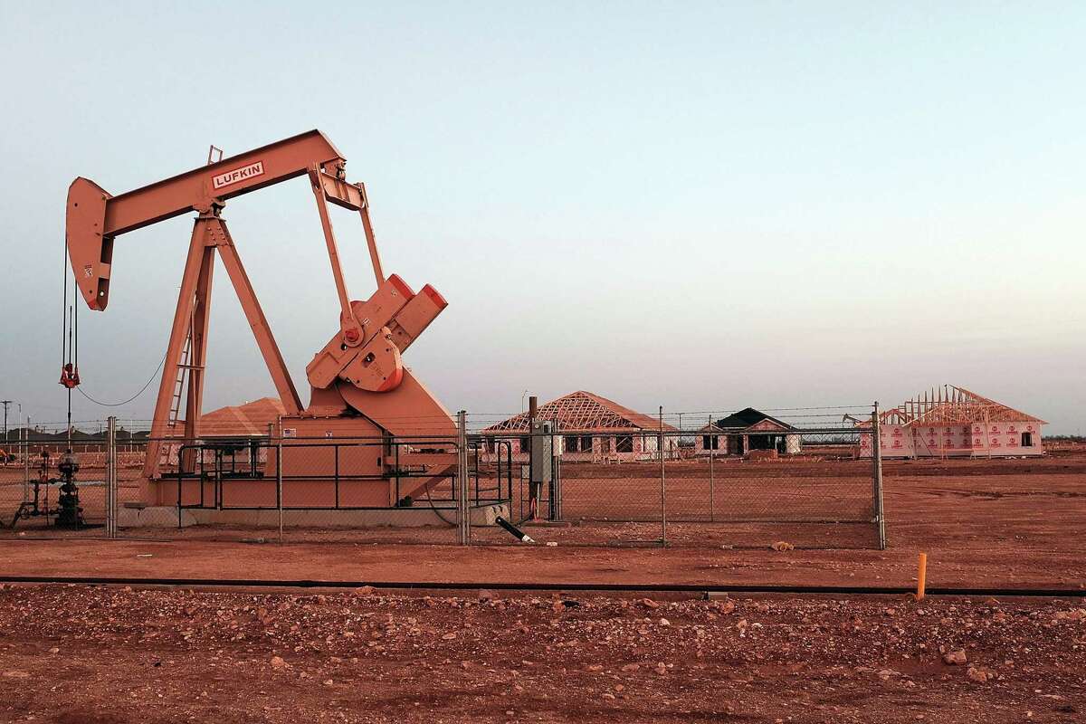 An oil well in Midland, Texas. Earthquakes are increasing to record levels in areas of shale production. (Spencer Platt/Getty Images/TNS)