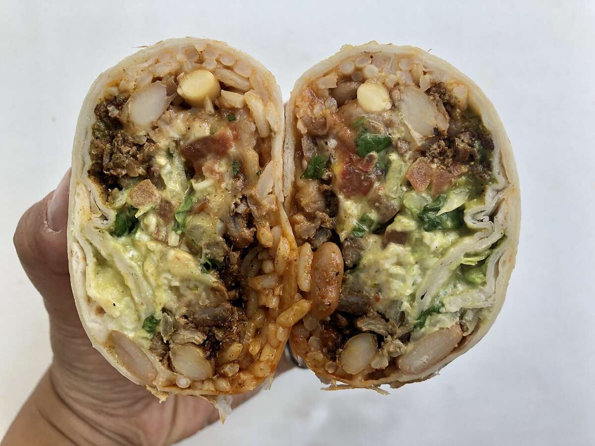 A super burrito with al pastor at Cuco's Burritos.