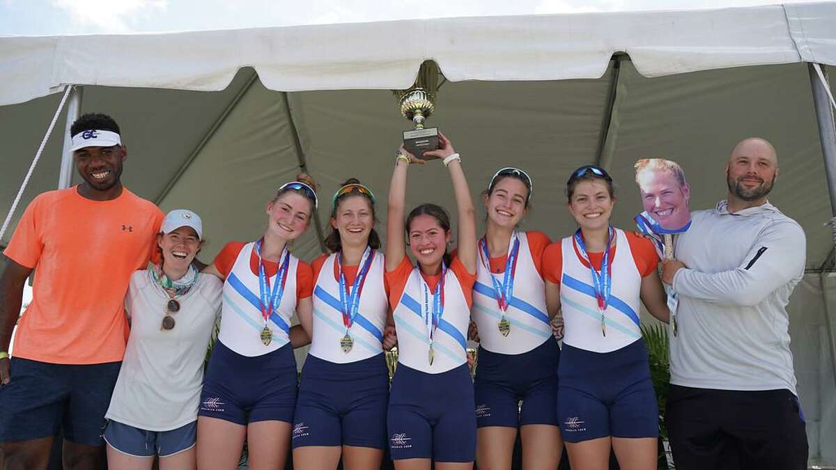 The Greenwich Crew Girls 4+ won the USRowing Youth Nationals last week. From left, wearing orange t-shirts: Coach Lawrence Lopez-Menzies, Coach Heidi Hunsberger, Lucy Barratt, Eva Andersen, Hannah Scott, Isabelle Ritchie, Meredith Blanchard, Coach Paul Ruggeberg and Coach Catherine Starr (cardboard cutout)