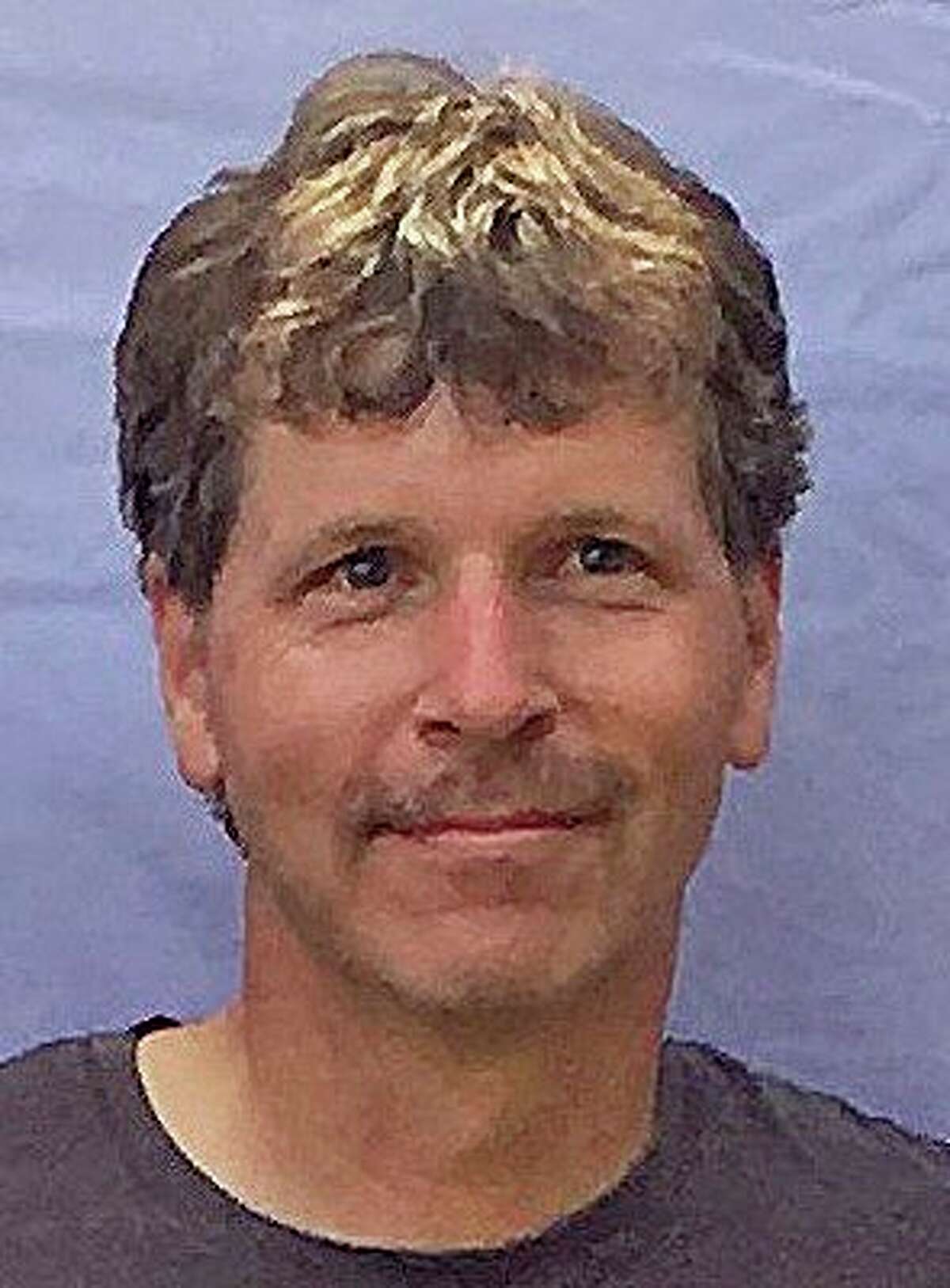 Mark Prescott, Bad Axe High School girls tennis coach, died Wednesday in a cycling accident west of Bad Axe. He is survived by his wife, Maria, and daughter, Jelena. (Tribune File Photo)