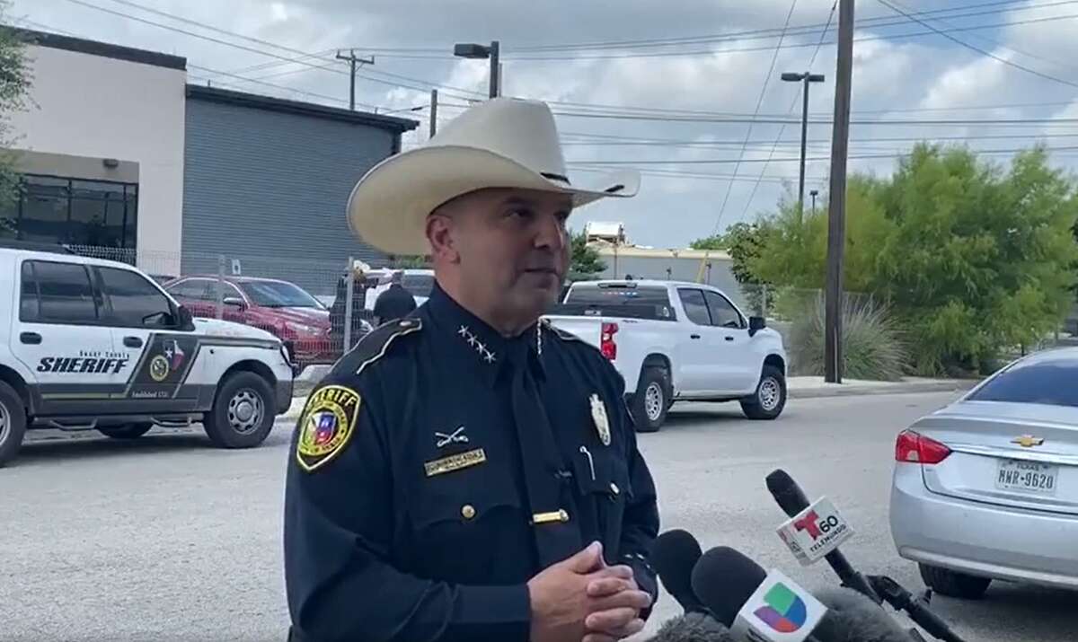 Sheriff Javier Salazar gives a briefing after deputies arrested a man who they said fired shots inside a downtown hotel before running into the county elections office Friday morning.