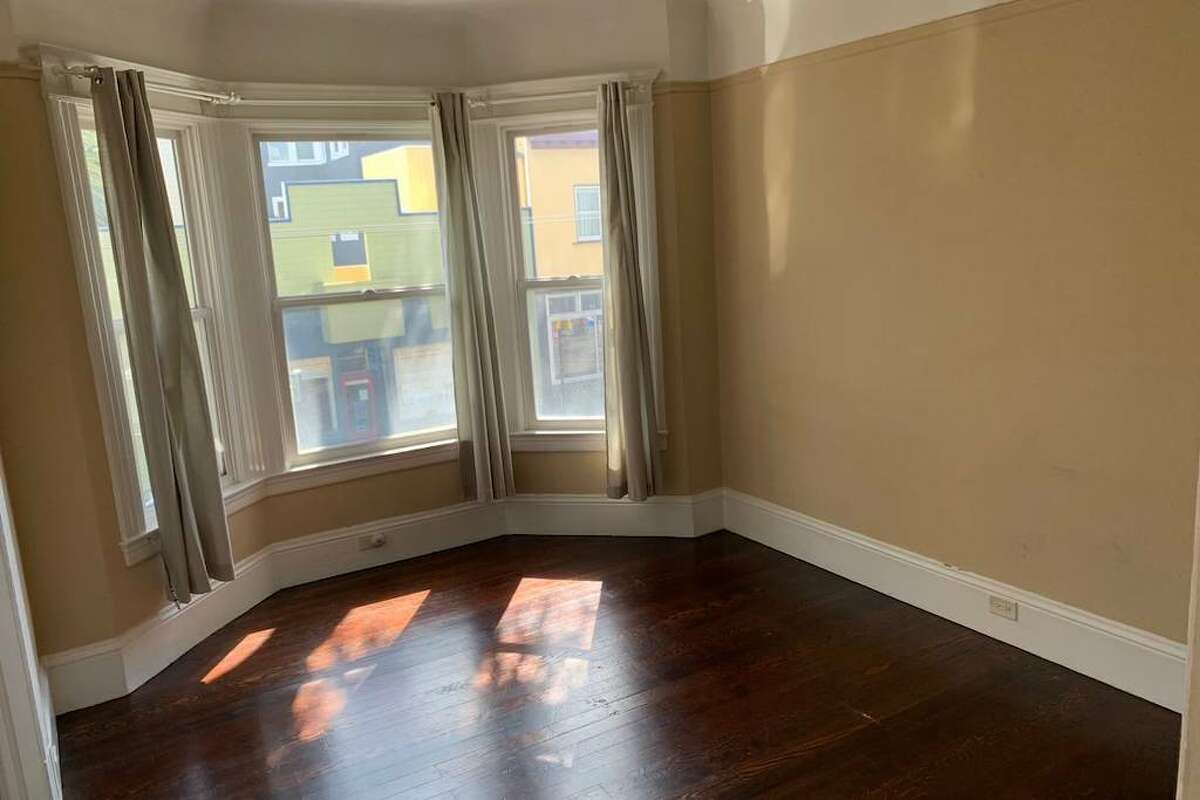 There is "a lot of original charm" and real hardwood floors throughout the apartment.