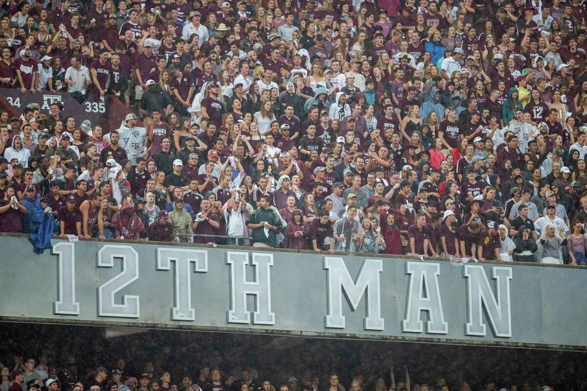 Texas A&M fans cheer on the Aggies against Clemson during the first half of an NCAA college football game Saturday, Sept. 8, 2018, in College Station, Texas. (AP Photo/Sam Craft)