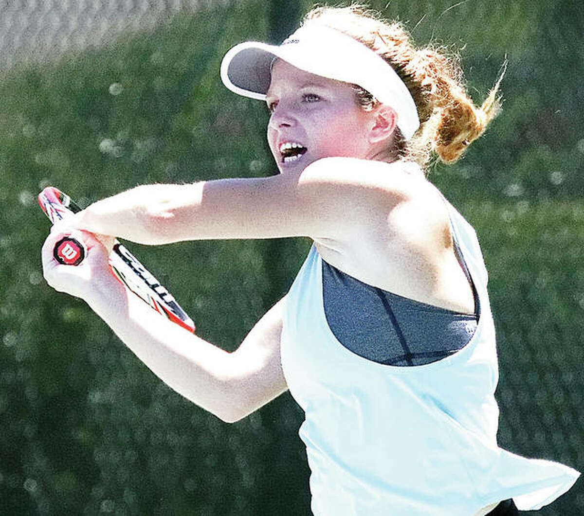 Janelle Wilson of Godfrey makes a return in a previous Alton Open Tennis Tournament. After a summer off because of the pandemic, Alton’s summer tennis tournament are back.