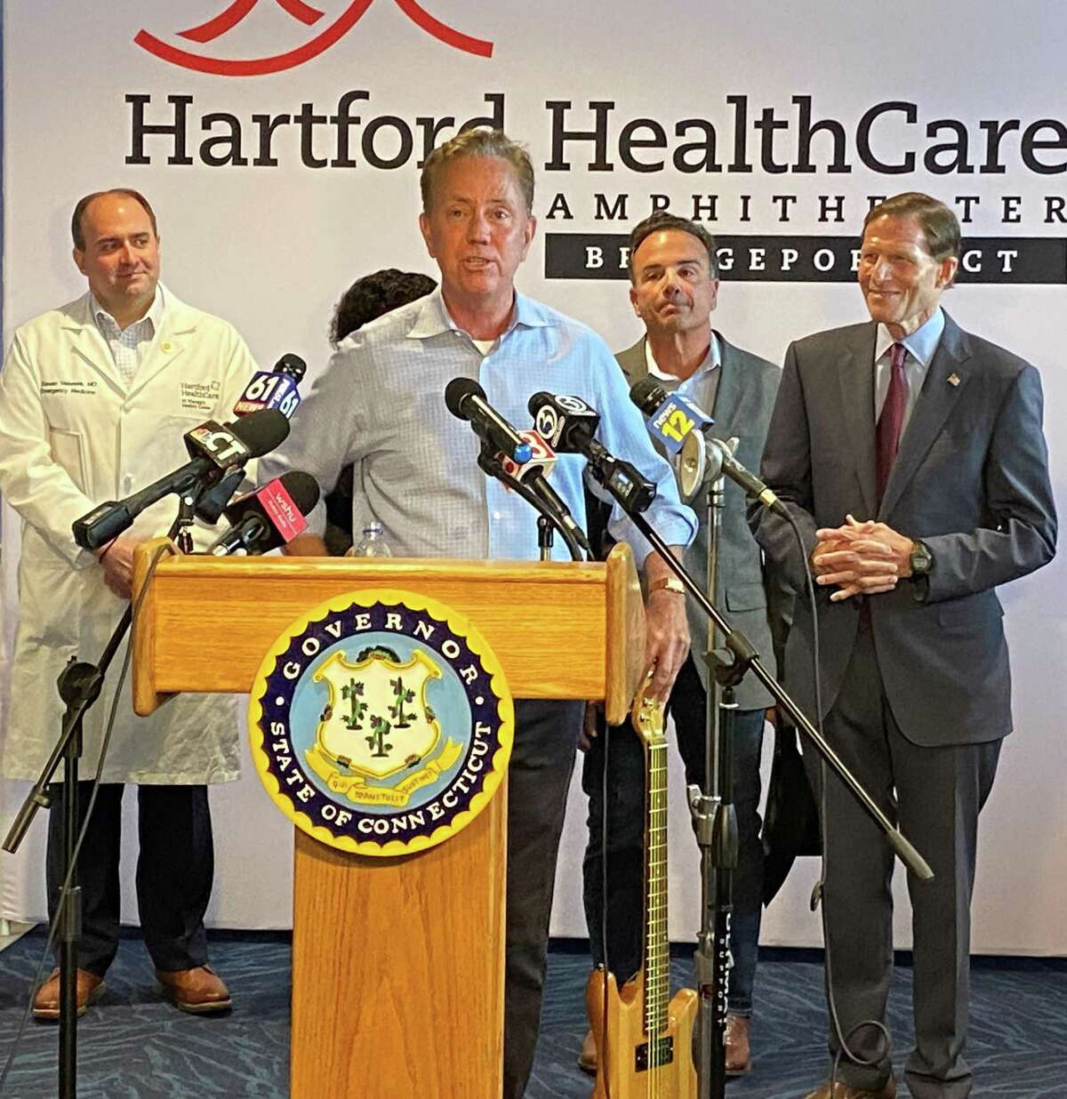 Gov. Ned Lamont talks about the state’s new Rock the Shot vaccine incentive program Friday, June 25, 2021 at the Hartford Healthcare Amphitheater.