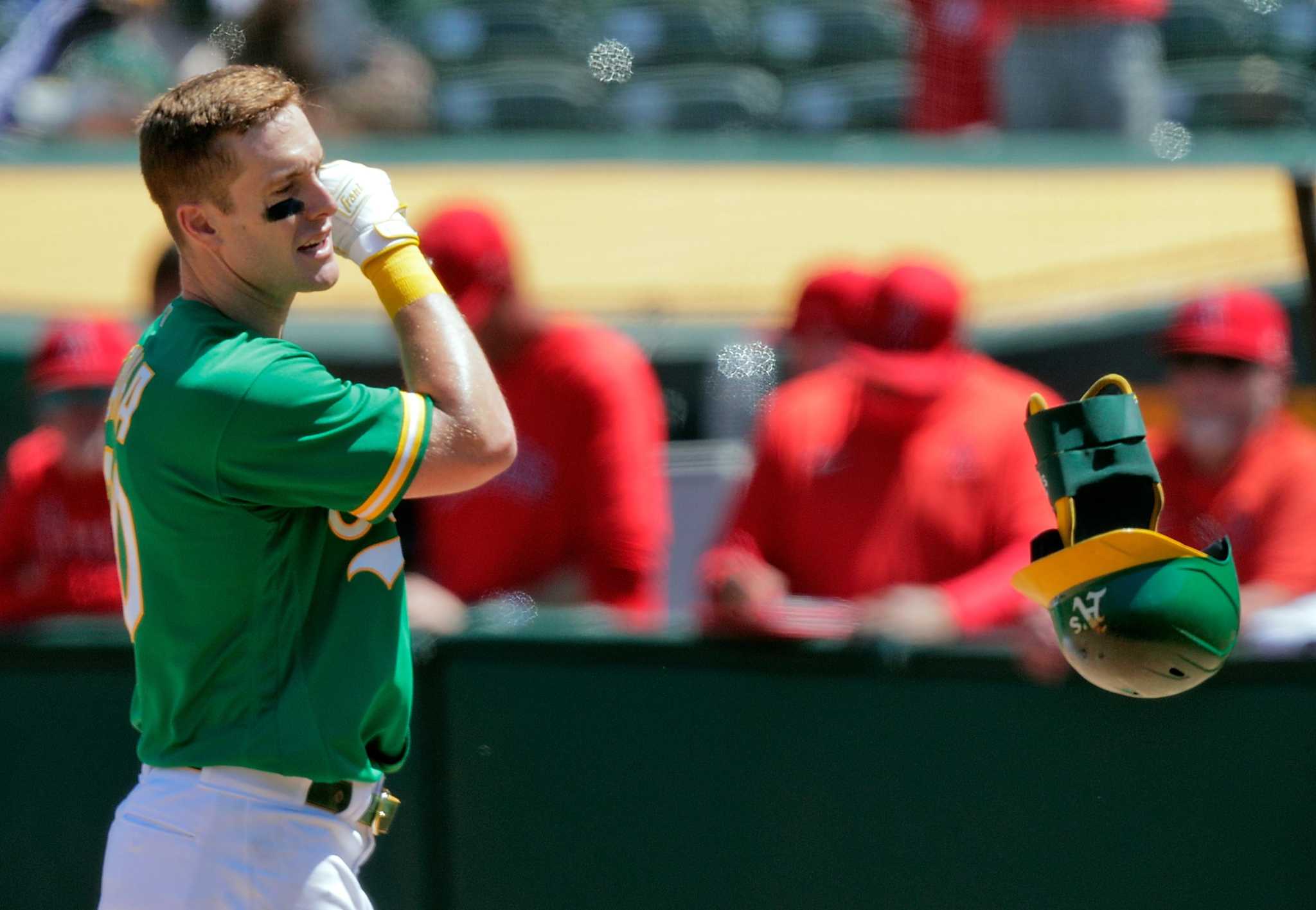 Athletics' Mark Canha to undergo MRI on left hip