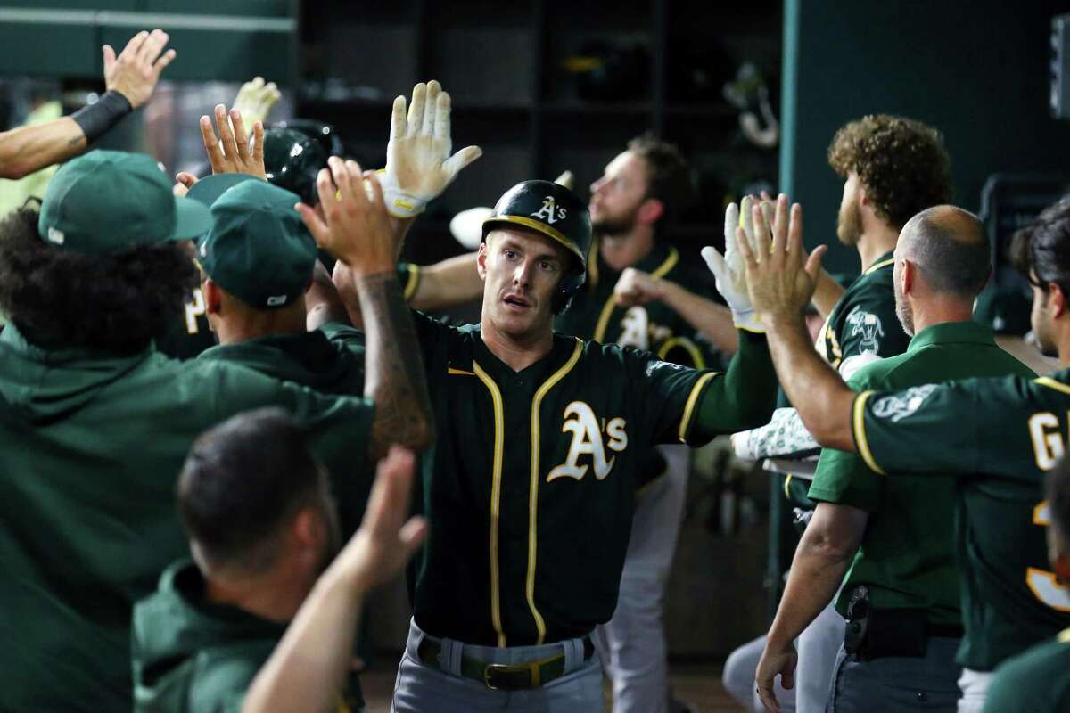 Athletics' Mark Canha to undergo MRI on left hip