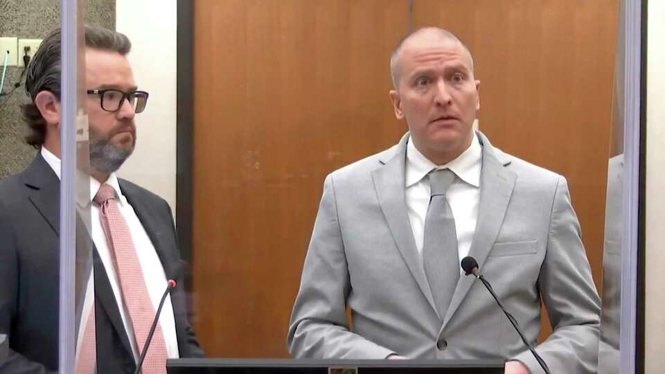 In this image taken from video, former Minneapolis police Officer Derek Chauvin, right, accompanied by defense attorney Eric Nelson, addresses the court as Hennepin County Judge Peter Cahill presides over Chauvin's sentencing, Friday, June 25, 2021, at the Hennepin County Courthouse in Minneapolis. Chauvin faces decades in prison for the May 2020 death of George Floyd. (Court TV via AP, Pool)