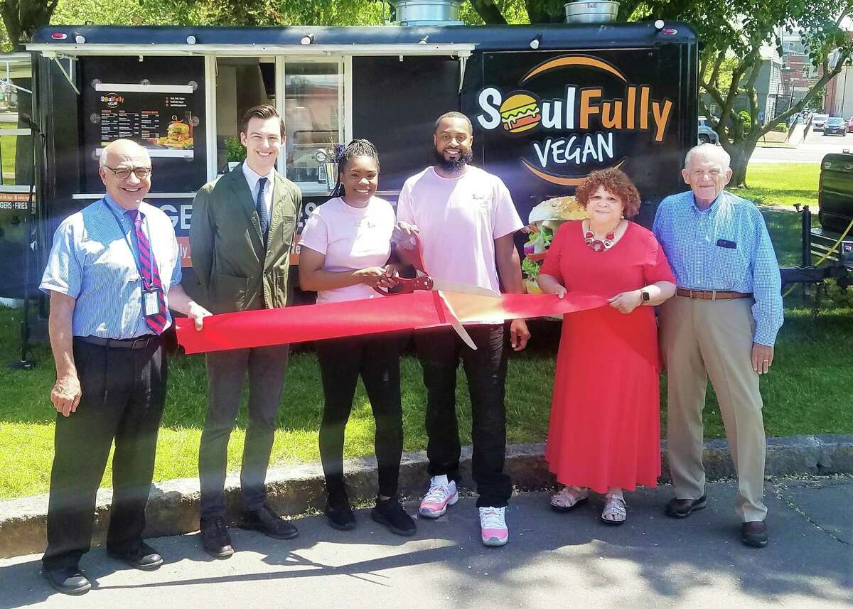 The Soulfully Vegan food truck celebrated a grand opening in May. From left are Middletown Economic Development Specialist Thomas Marano, Mayor Ben Florsheim, co-owners Allison Vaughan and her husband Calvin Vaughan, Middlesex County Chamber of Commerce Central Business Bureau Chairwoman Pamela Steele and President Larry McHugh.