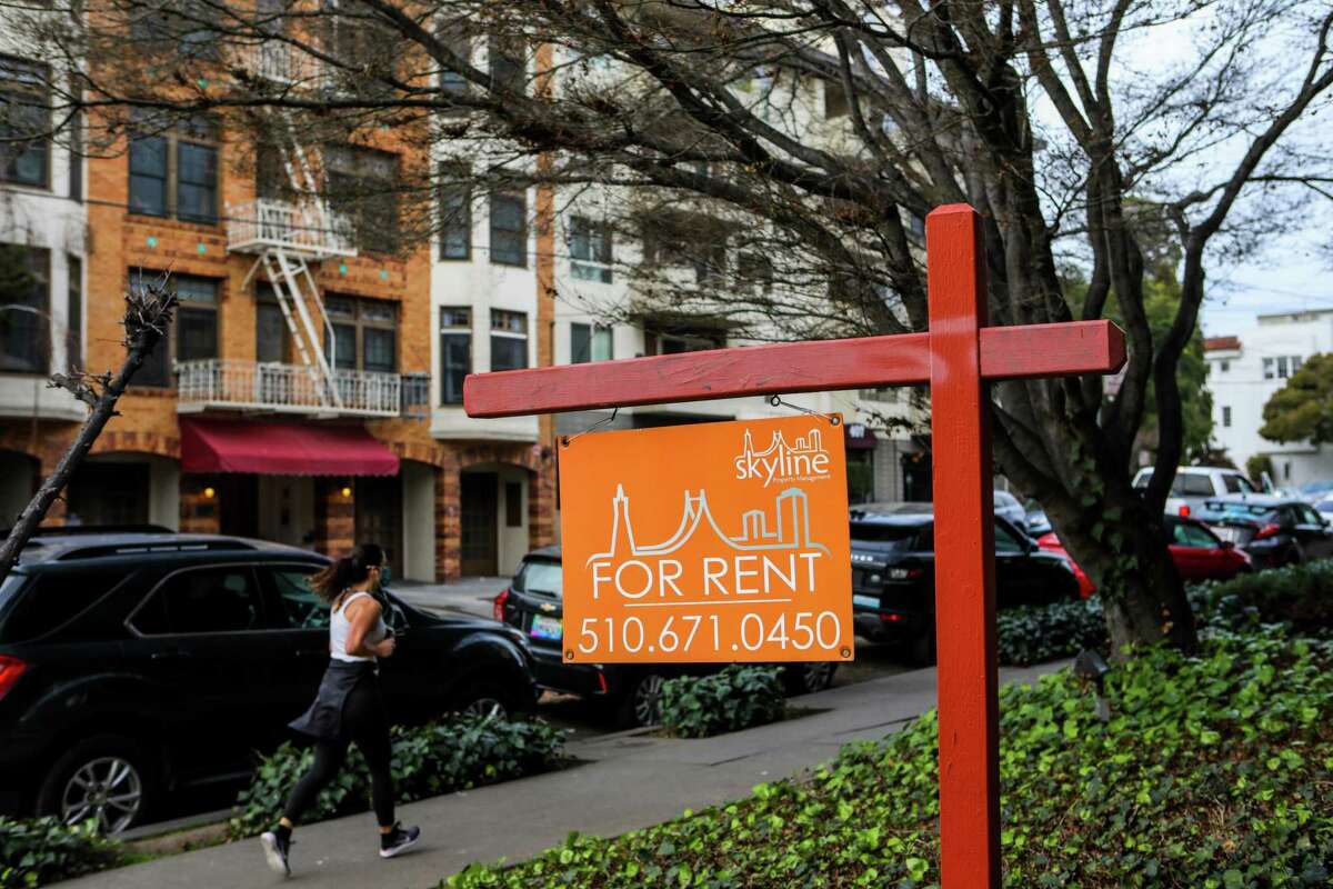 Lakeshore Park Apartments advertise a for rent sign on their property at 420 Perkins St. in the Adams Point neighborhood on Tuesday, January 12, 2021, in Oakland, Calif. It’s no secret that the Bay Area has some of the highest rents in the nation. But that still might be less expensive than buying a home, data shows.