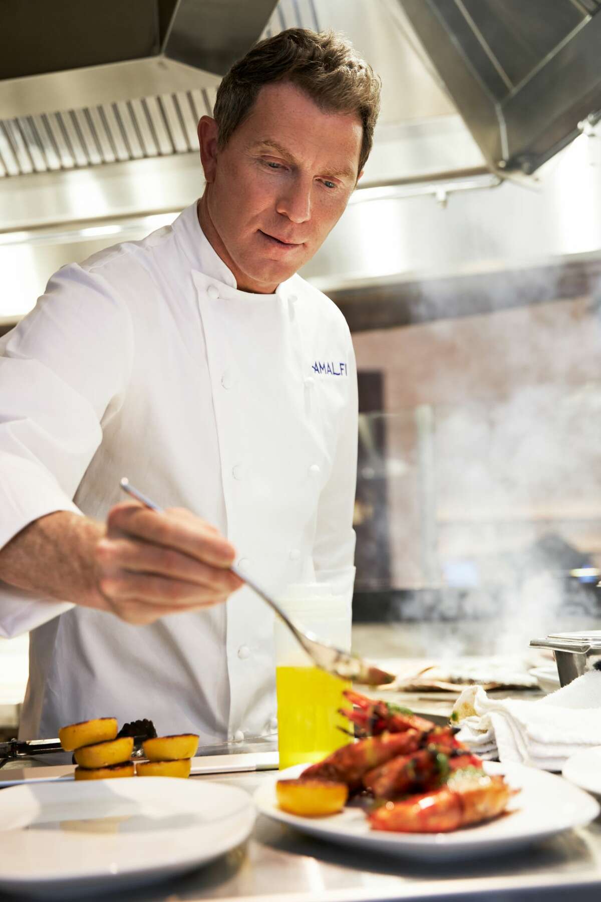 Chef Bobby Flay in the kitchen at Amalfi by Bobby Flay, Caesars Palace, Las Vegas