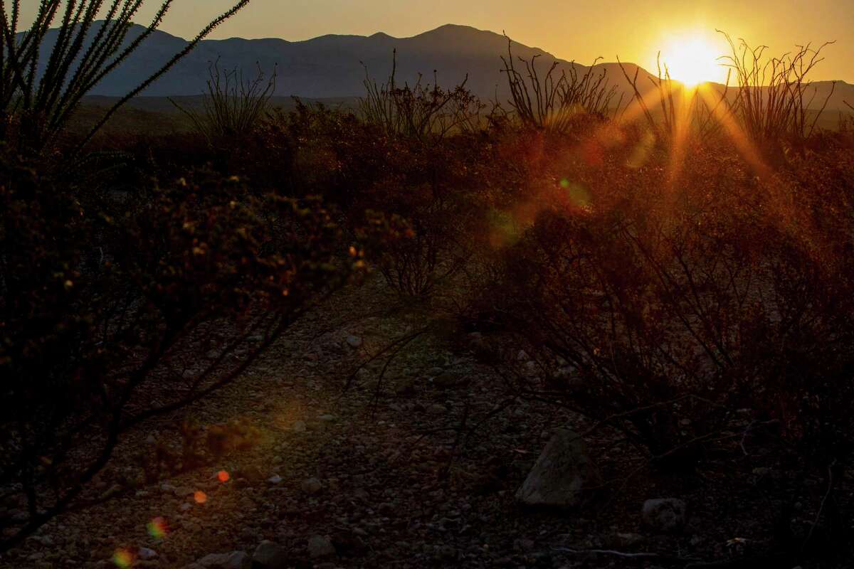 The sun rises over the desert near Candelaria where more migrants are trying to get into the U.S. Migrants can spend days walking through the mountains and desert terrain under the hot sun.