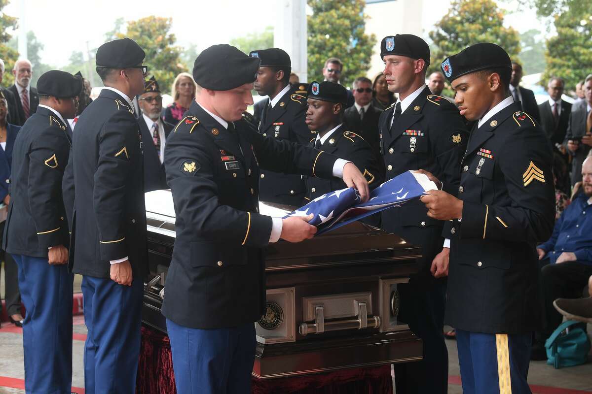 The flag is folded during the funeral service for W.L. Pate at One City Church Friday. Photo made Friday, June 25, 2021 Kim Brent/The Enterprise