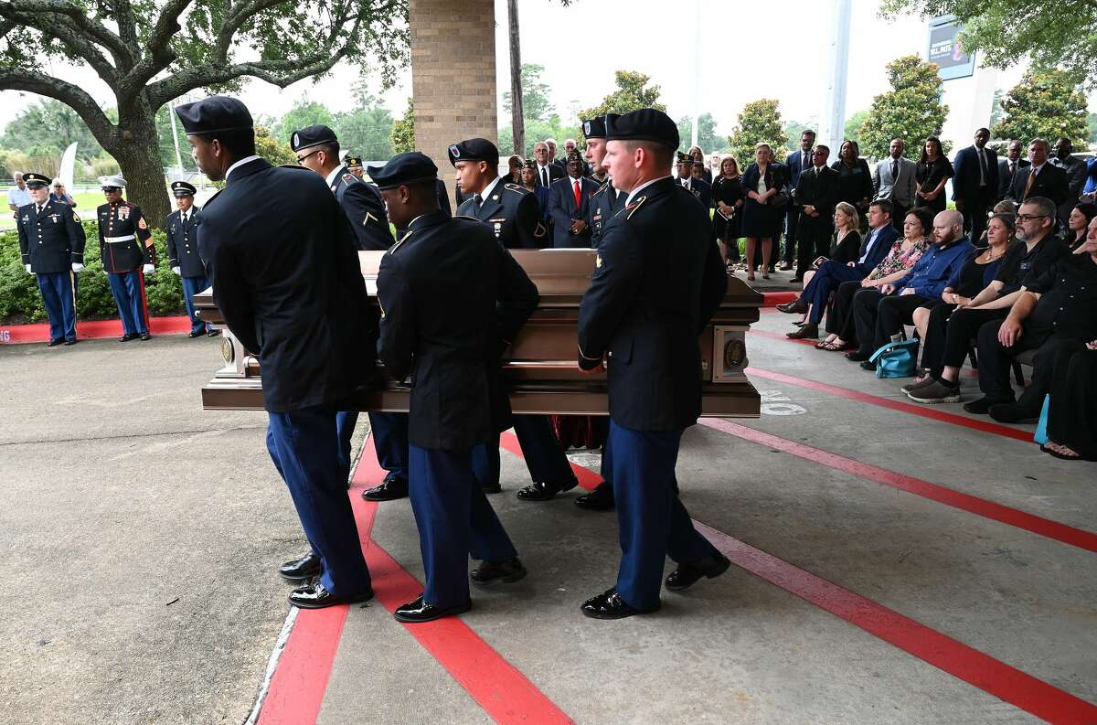 Honor guardsmen cary the casket following the funeral service for W.L. Pate at One City Church Friday. Photo made Friday, June 25, 2021 Kim Brent/The Enterprise
