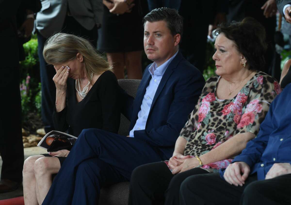 Fiance Sherrene Danks-Cook reacts as military honors are bestowed during the funeral service for W.L. Pate at One City Church Friday. Photo made Friday, June 25, 2021 Kim Brent/The Enterprise