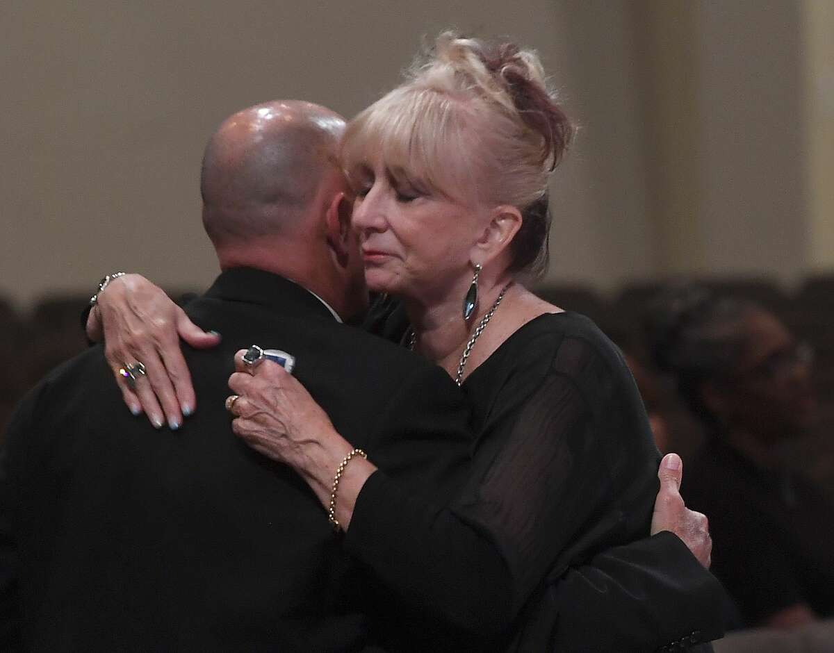 Sister-in-law Sandy Pate greets guests arrivinng for the funeral service for W.L. Pate at One City Church Friday. Photo made Friday, June 25, 2021 Kim Brent/The Enterprise