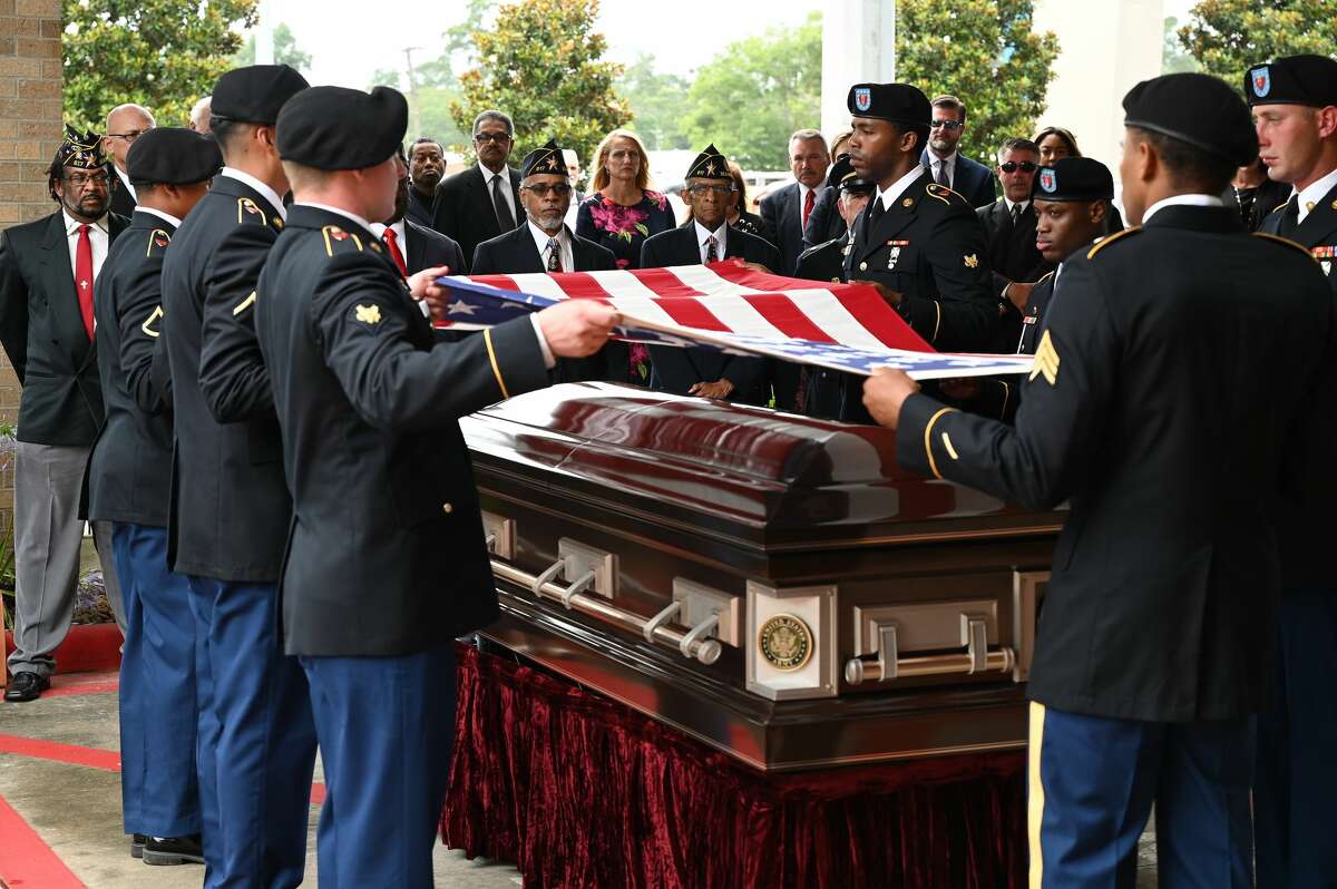 The crowd gathers outside for a military honors ceremony during the funeral service for W.L. Pate at One City Church Friday. Photo made Friday, June 25, 2021 Kim Brent/The Enterprise