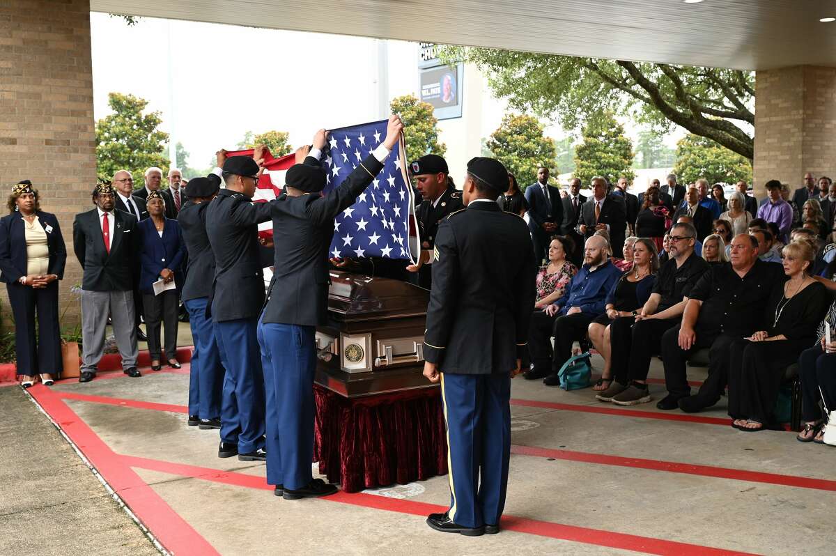 The crowd gathers outside for a military honors ceremony during the funeral service for W.L. Pate at One City Church Friday. Photo made Friday, June 25, 2021 Kim Brent/The Enterprise