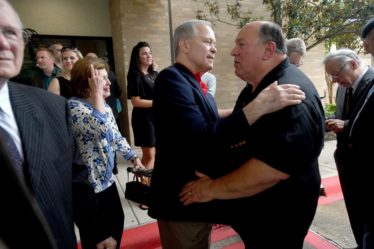 Frank Messina talks with Robert Pate during the funeral service for W.L. Pate at One City Church Friday. Photo made Friday, June 25, 2021 Kim Brent/The Enterprise