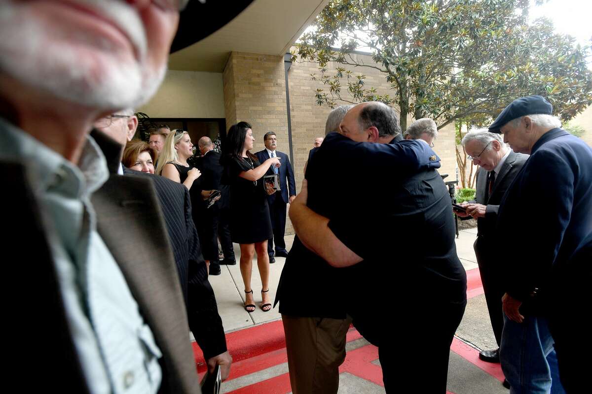 Family and friends console one another following the funeral service for W.L. Pate at One City Church Friday. Photo made Friday, June 25, 2021 Kim Brent/The Enterprise
