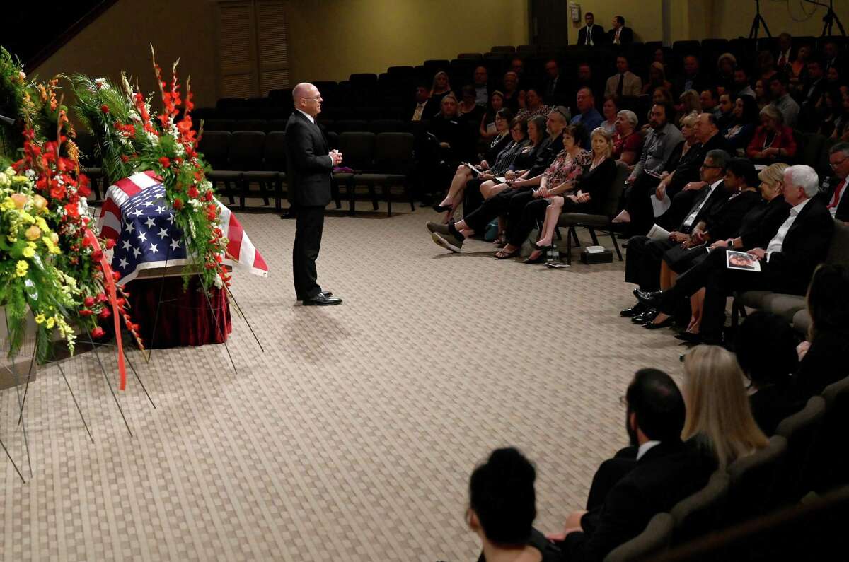 Pastor Randy Feldschau leads an opening invocation during the funeral service for W.L. Pate at One City Church Friday. Photo made Friday, June 25, 2021 Kim Brent/The Enterprise