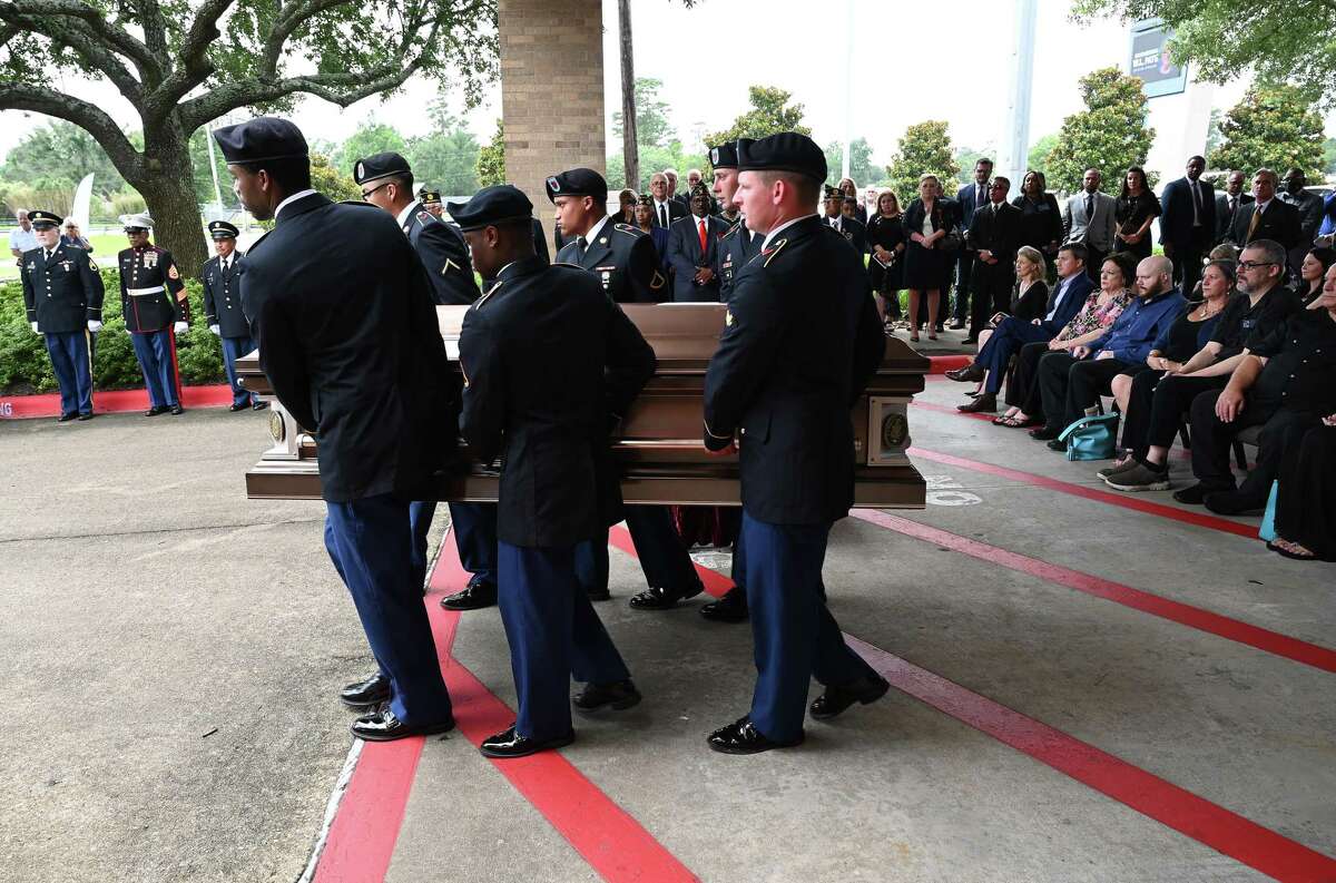 Honor guardsmen cary the casket following the funeral service for W.L. Pate at One City Church Friday. Photo made Friday, June 25, 2021 Kim Brent/The Enterprise