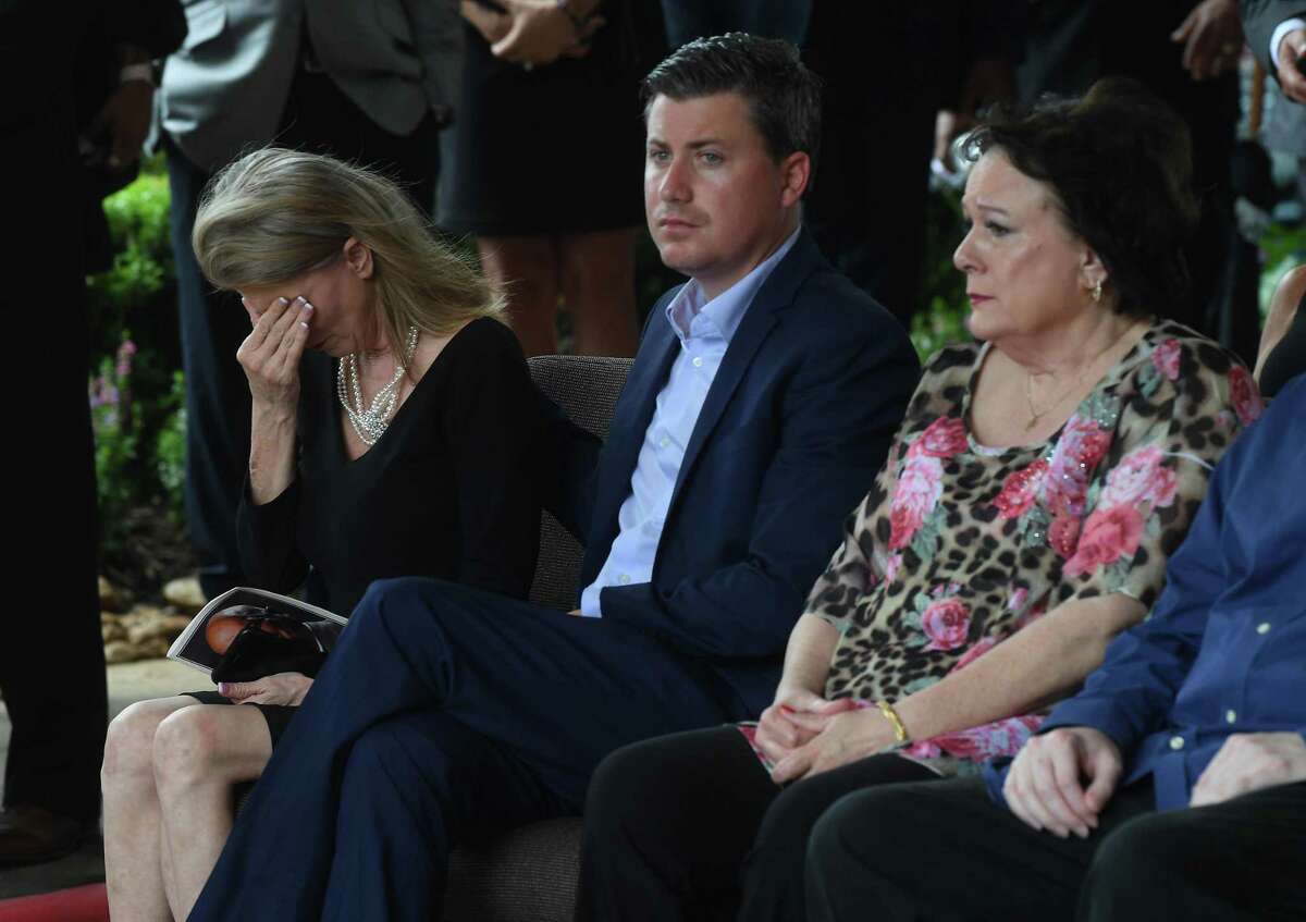 Fiance Sherrene Danks-Cook reacts as military honors are bestowed during the funeral service for W.L. Pate at One City Church Friday. Photo made Friday, June 25, 2021 Kim Brent/The Enterprise
