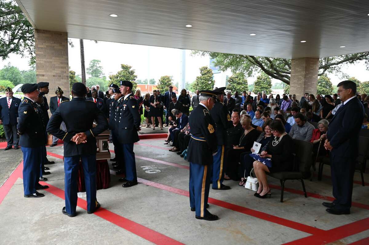 The crowd gathers outside for a military honors ceremony during the funeral service for W.L. Pate at One City Church Friday. Photo made Friday, June 25, 2021 Kim Brent/The Enterprise