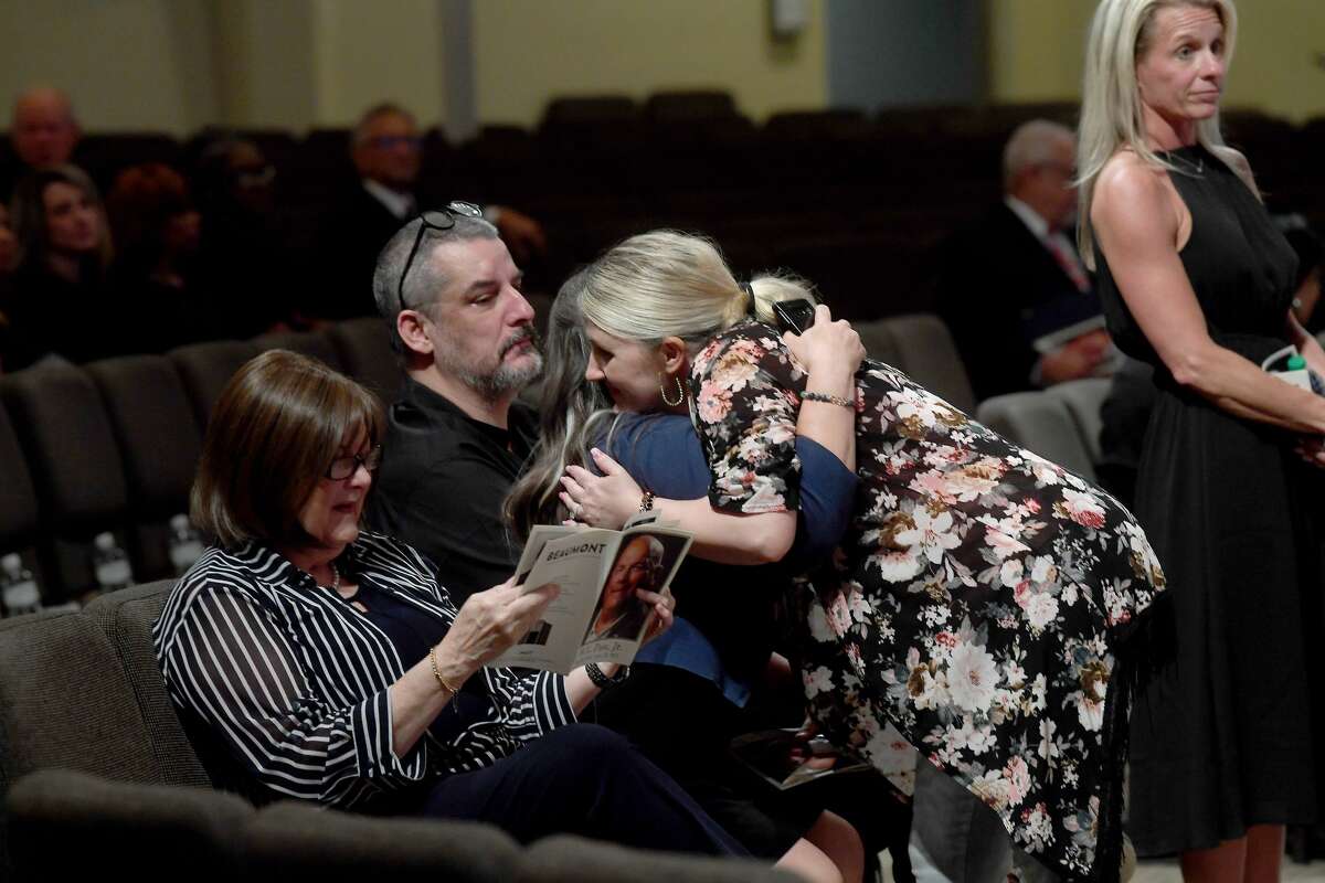 Family greet one another during the funeral service for W.L. Pate at One City Church Friday. Photo made Friday, June 25, 2021 Kim Brent/The Enterprise