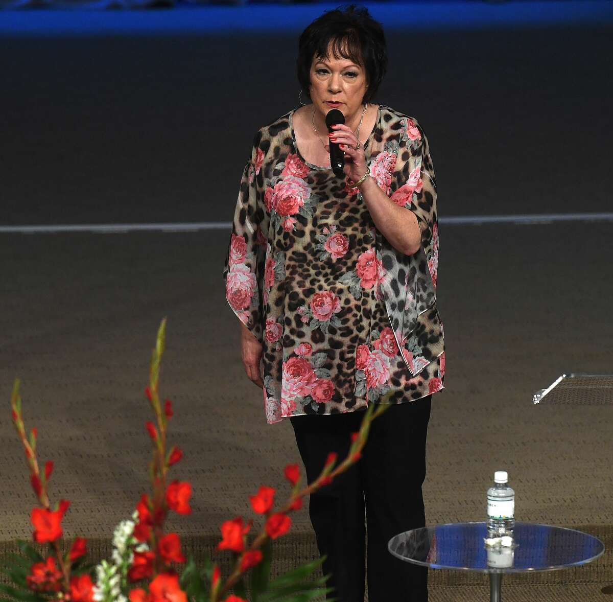Pam Pate sings during the funeral service for her brother W.L. Pate at One City Church Friday. Photo made Friday, June 25, 2021 Kim Brent/The Enterprise