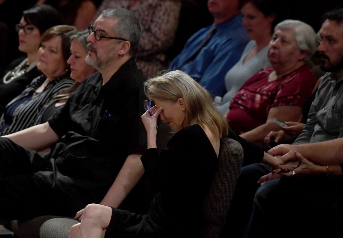 Sherrene Danks-Cook reacts as speakers share their memories of her fiance during the funeral service for W.L. Pate at One City Church Friday. Photo made Friday, June 25, 2021 Kim Brent/The Enterprise