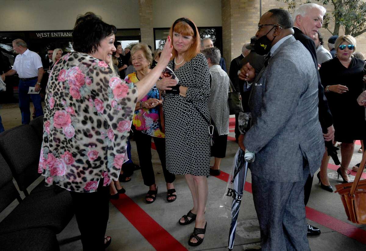 Pam Pate waves to. a friend during the funeral service for her brother W.L. Pate at One City Church Friday. Photo made Friday, June 25, 2021 Kim Brent/The Enterprise