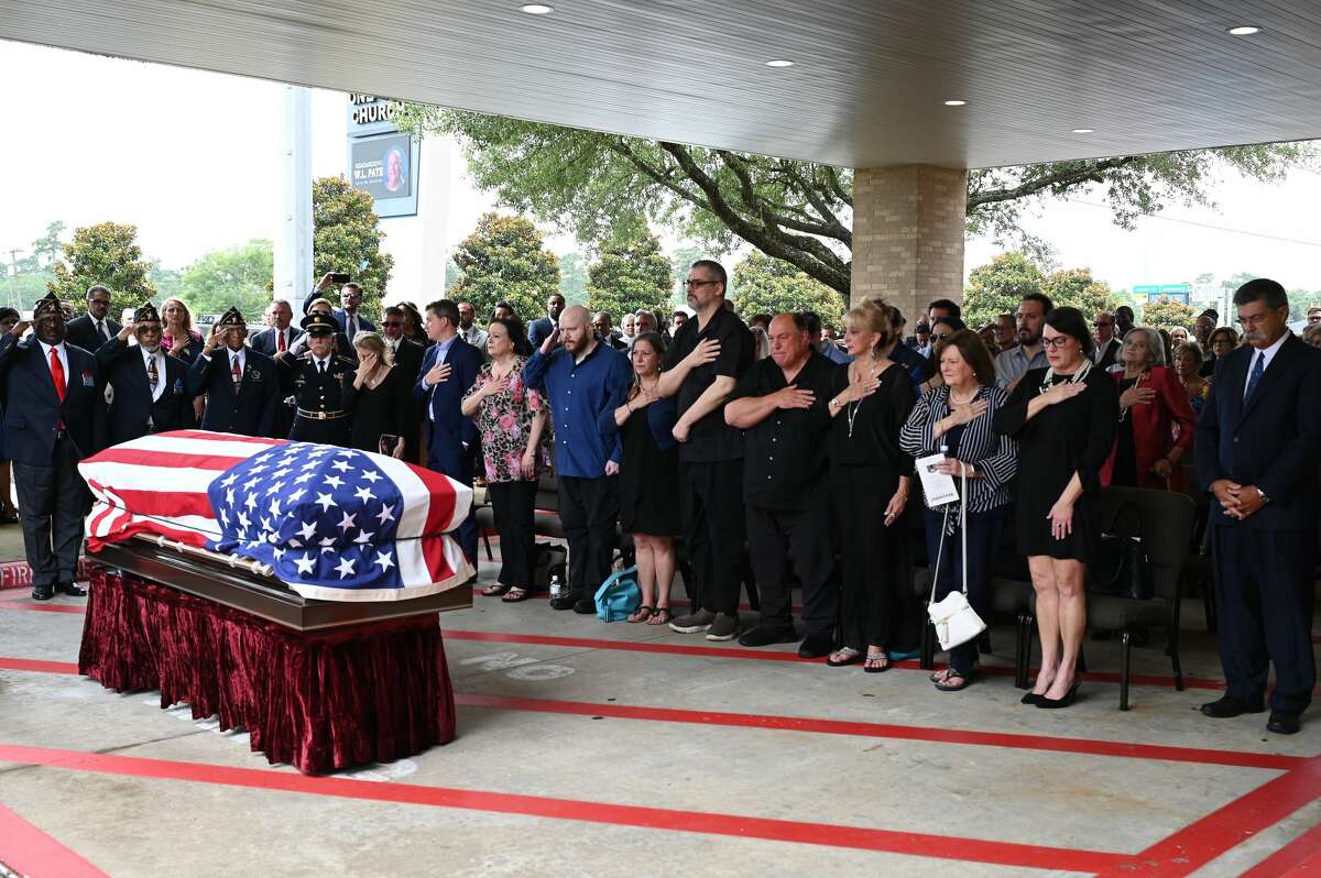 The crowd gathers outside for a military honors ceremony during the funeral service for W.L. Pate at One City Church Friday. Photo made Friday, June 25, 2021 Kim Brent/The Enterprise