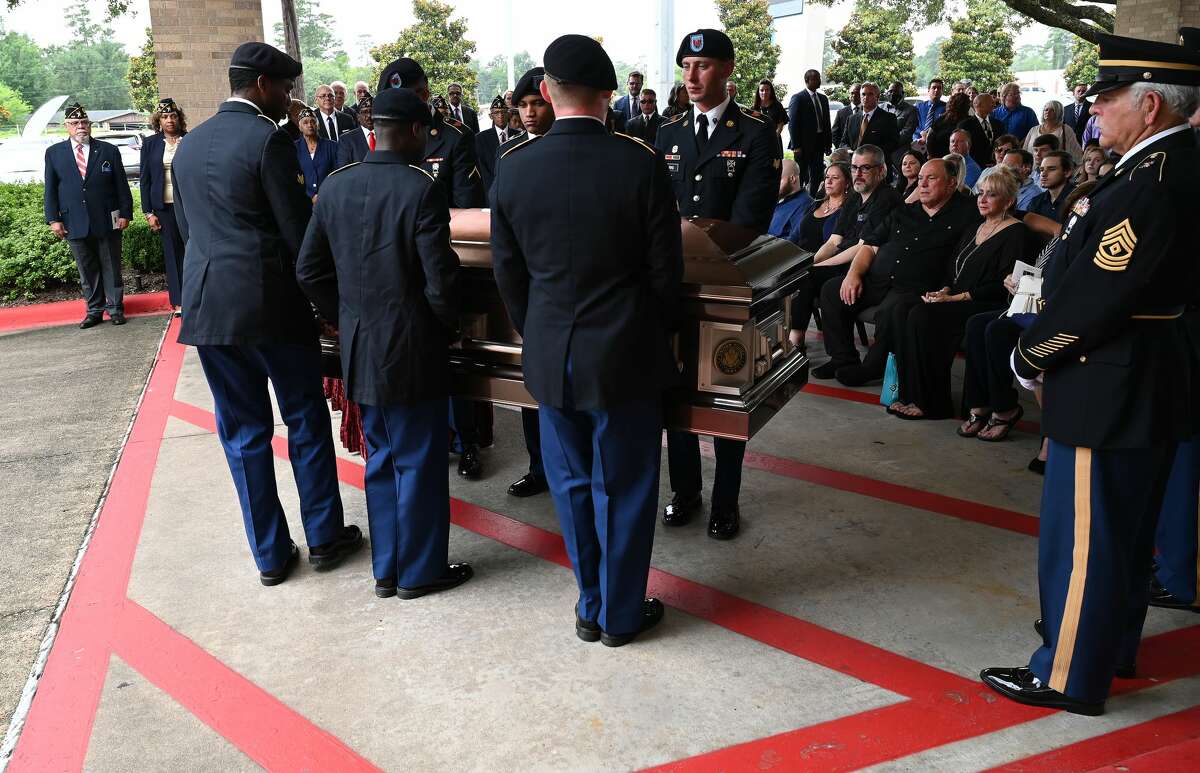 The crowd gathers outside for a military honors ceremony during the funeral service for W.L. Pate at One City Church Friday. Photo made Friday, June 25, 2021 Kim Brent/The Enterprise