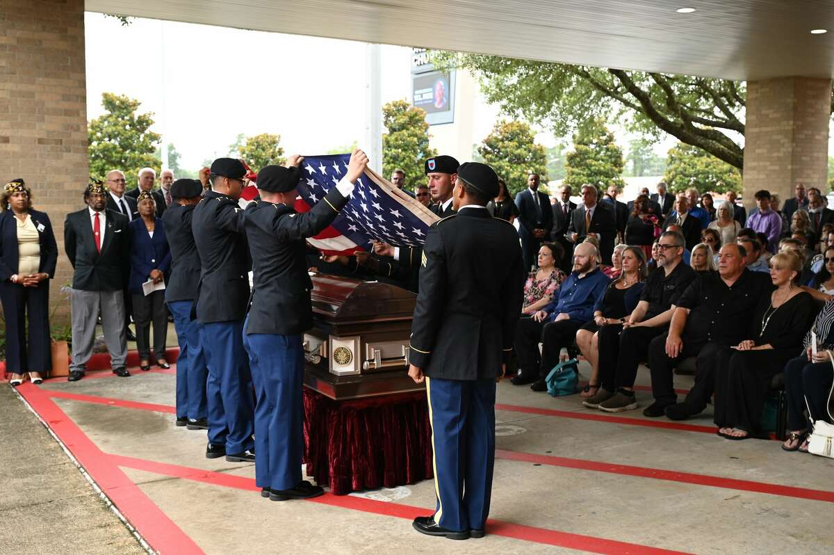 The crowd gathers outside for a military honors ceremony during the funeral service for W.L. Pate at One City Church Friday. Photo made Friday, June 25, 2021 Kim Brent/The Enterprise