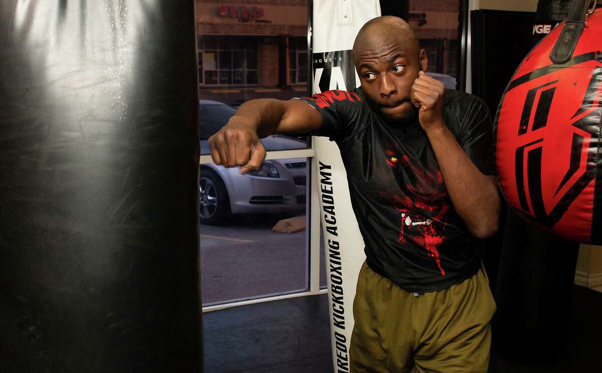 MMA fighter Charles “Rocko” Jones warms up for a training session, Wednesday, June 10, 2021, at the Laredo Kickboxing Academy.