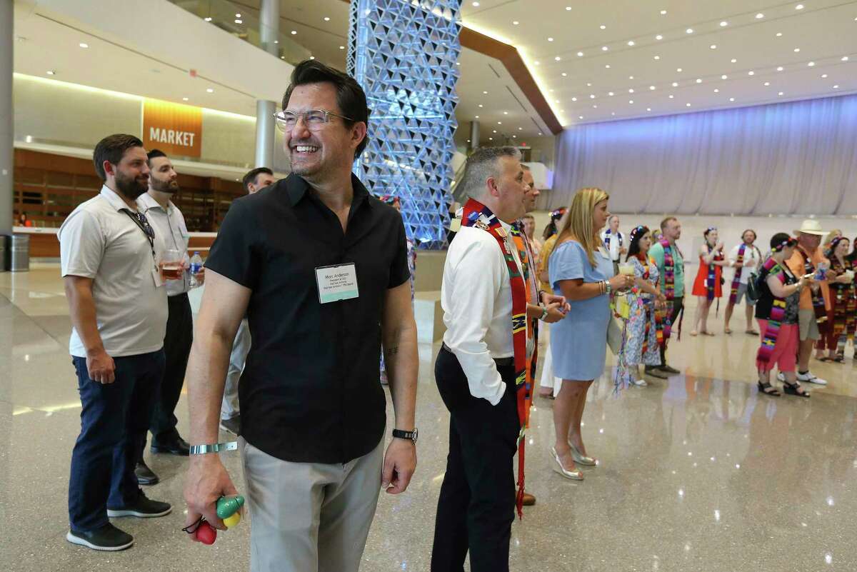 Marc Anderson, the new CEO of Visit San Antonio, smiles as he joins industry association officials from around the U.S. on a tour.