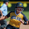 Midland's Kiara Kiely rounds third base during a June 5, 2021 district semifinal against Dow High. 